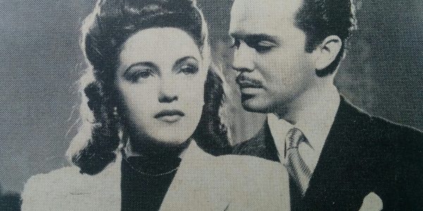 La actriz chivilcoyana Nélida Solá (Nélida Tomeo de Cánepa), y el actor y galán capitalino, Domingo Márquez, en una escena de la película «La sombra del pasado».